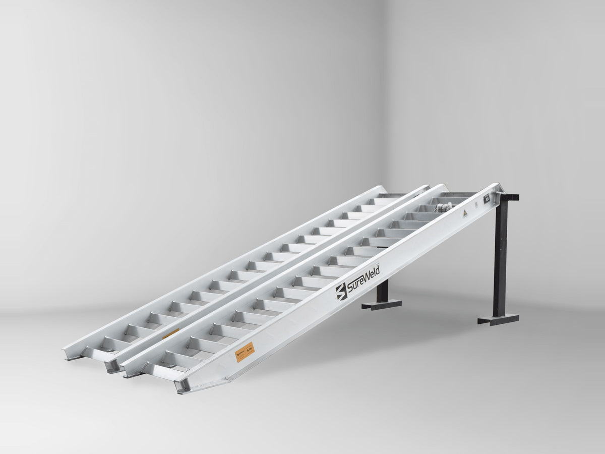 Sureweld 6-Tonne 3.6m x 600mm Track Series Aluminium Loading Ramps, pair, on stands
