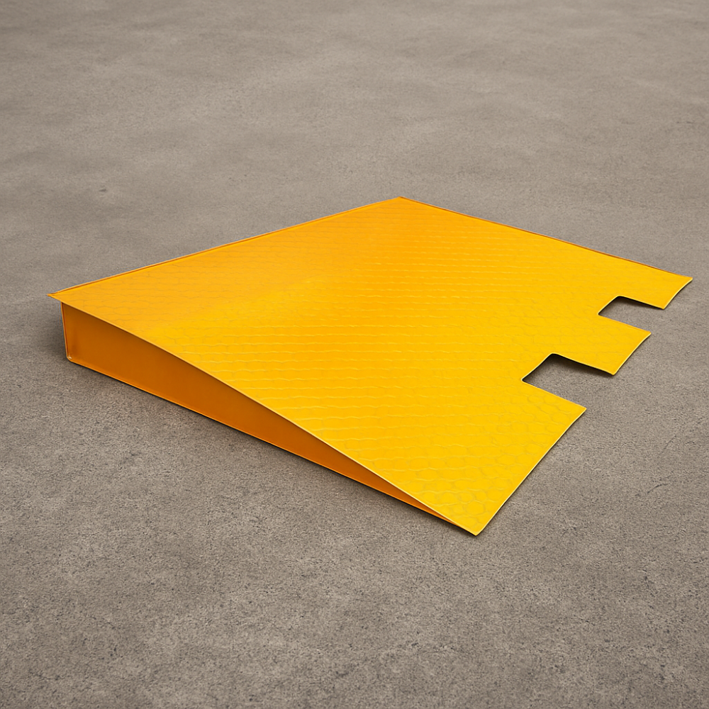Front angled view of a bright yellow industrial ramp with interlocking edges, placed on concrete flooring.