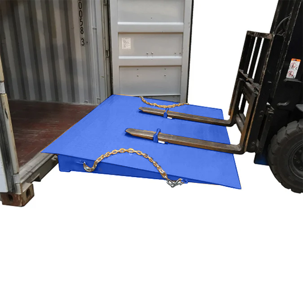 Close-up of ramp with forklift tines lifting it into position