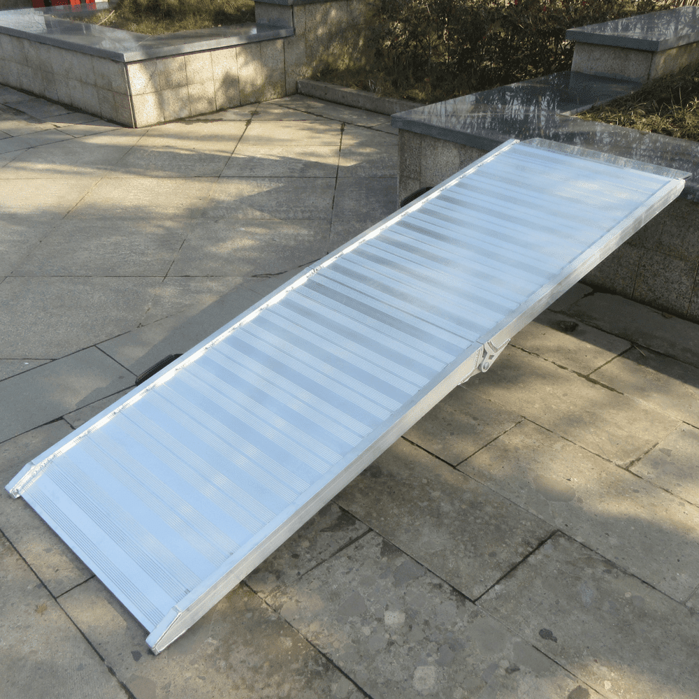 Folded aluminium ramp with non-slip ridges and curved design.