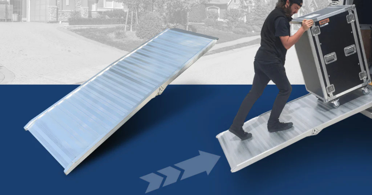 Man pushing a heavy-duty equipment case up an aluminium loading ramp with ridged surface, suitable for easy transport and access.