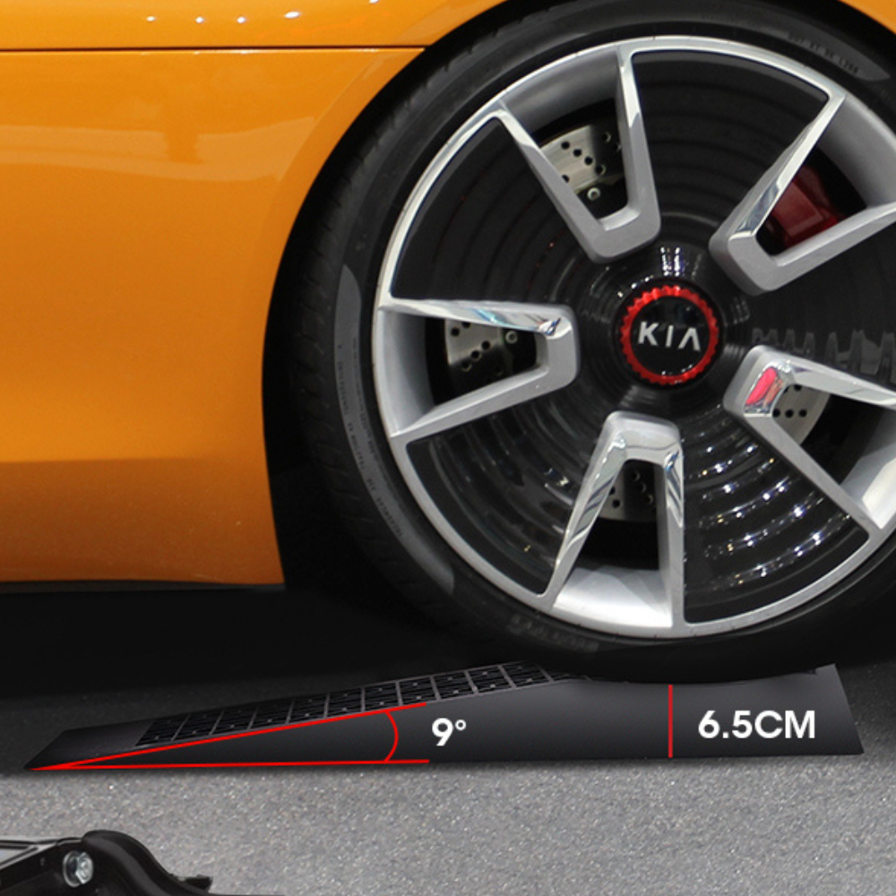 Close-up of a Kia car wheel with a ramp and its dimensions