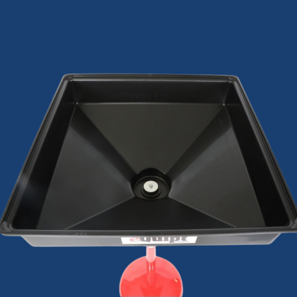 Black oil pan with a red funnel on a blue background