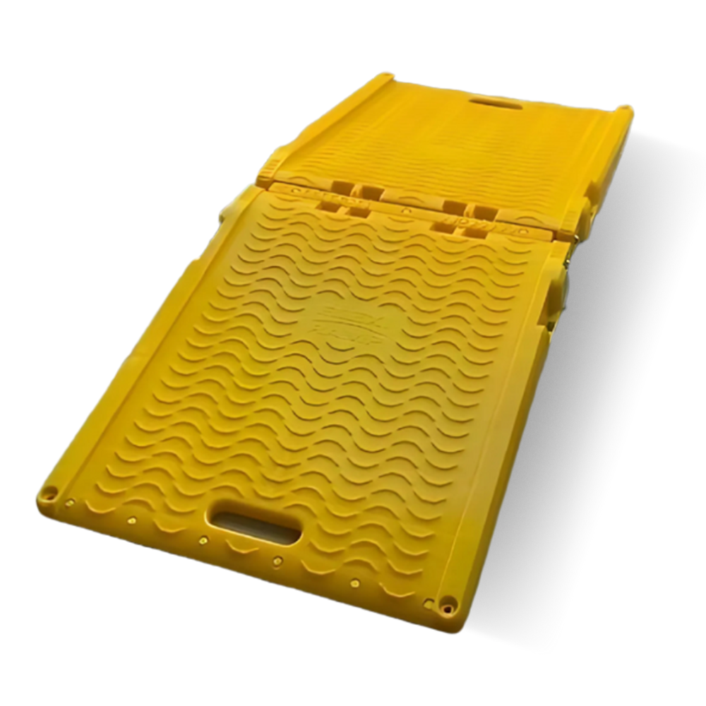 Bright yellow plastic ramp with non-slip surface and handle, shown folded out.
