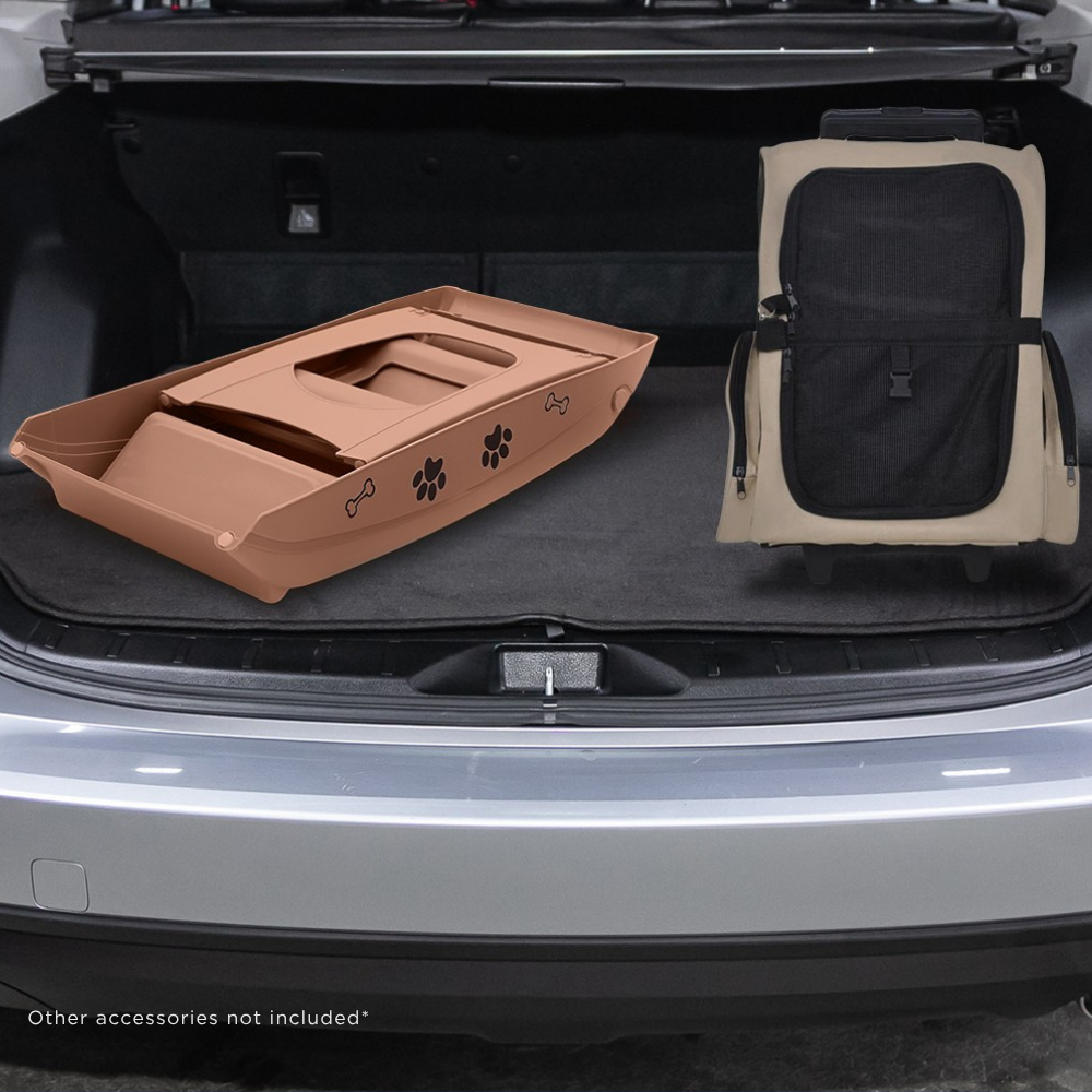 Car trunk with pet accessories including a brown pet bed and black pet seat.