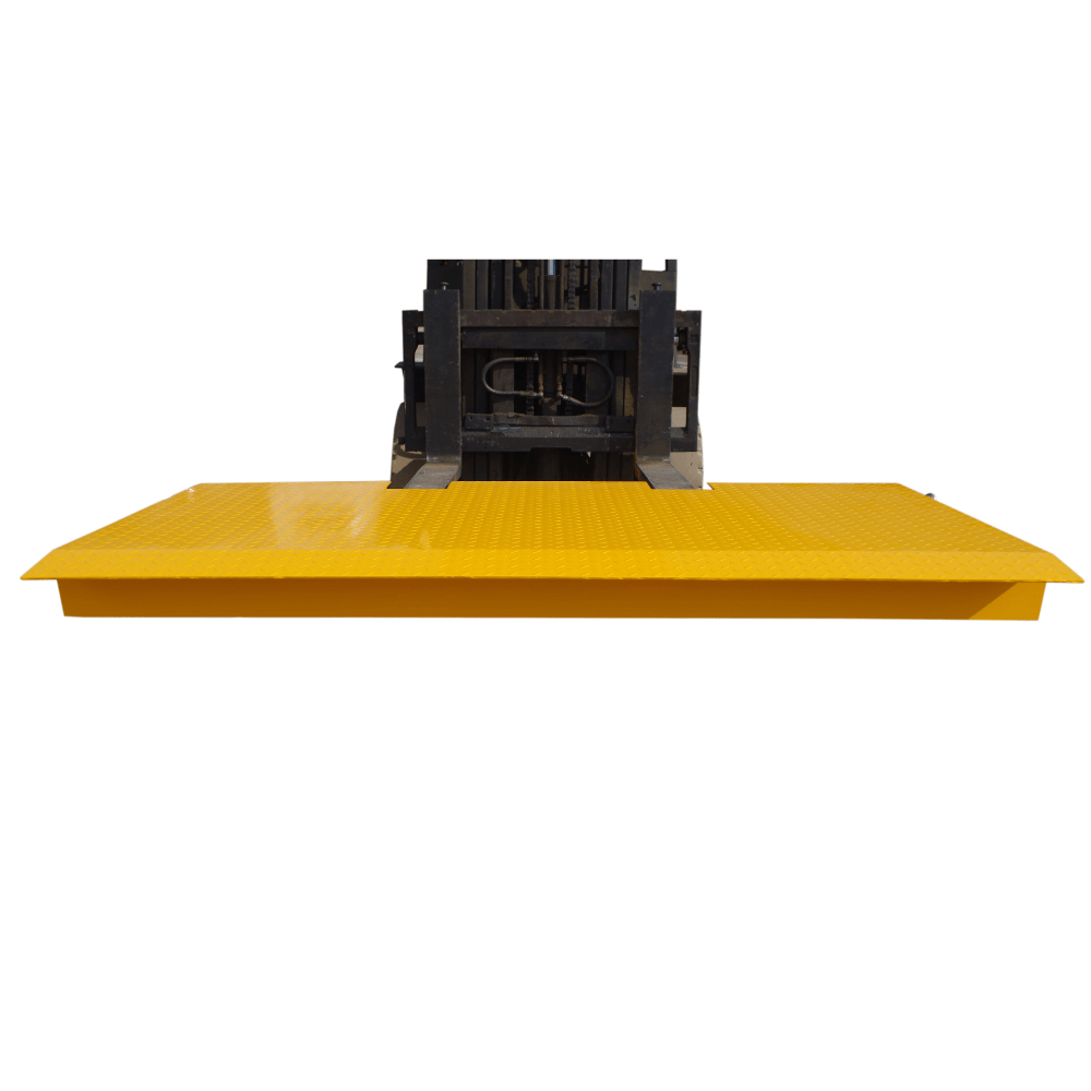 A yellow Heeve self-supporting forklift container ramp placed in front of an open shipping container, showing the forklift tyne slots and the anti-skid surface.