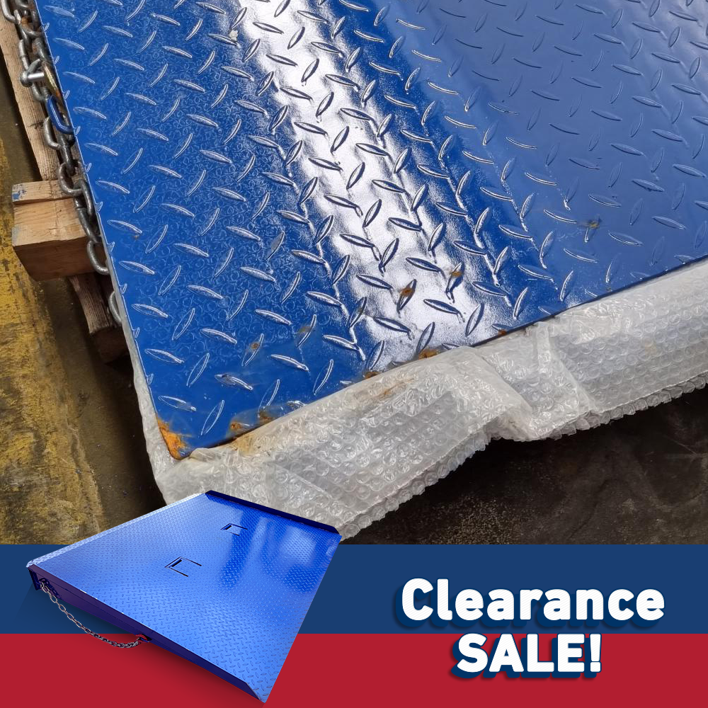 Detailed view of a blue ramp's textured diamond pattern surface, with a bubble wrap corner, and "Clearance Sale!" marked in the corner