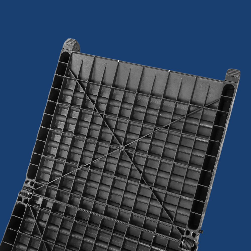 Black plastic ramp bottom view on a blue background