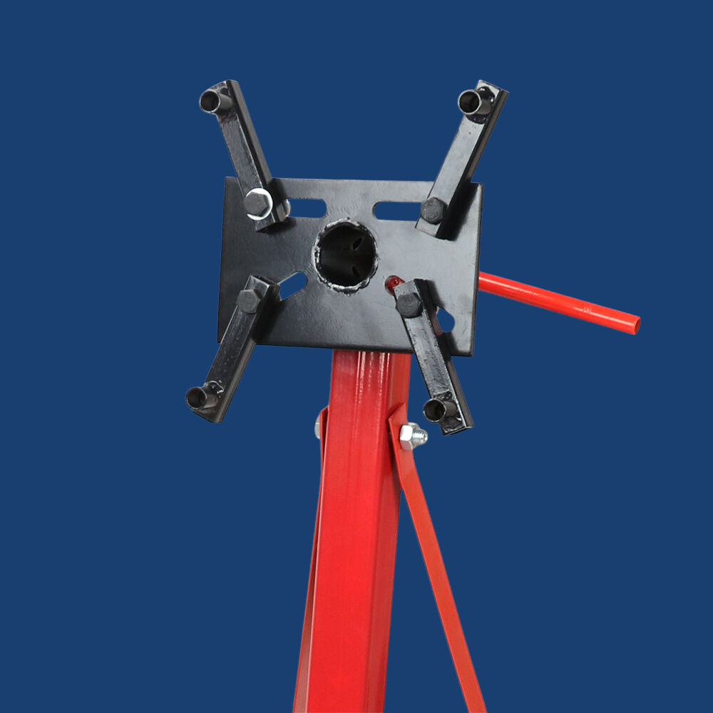 Metal stand with red straps against a blue background