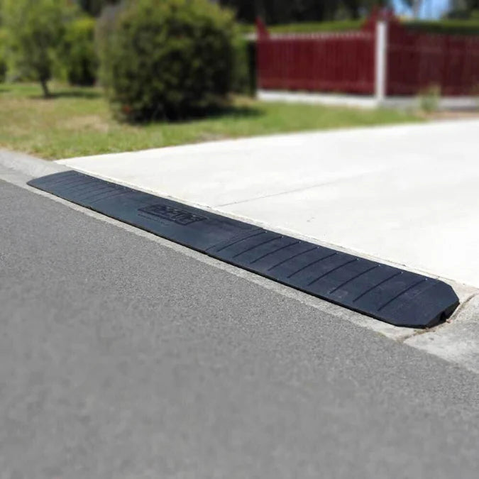 Ramp flush-mounted in a residential driveway.