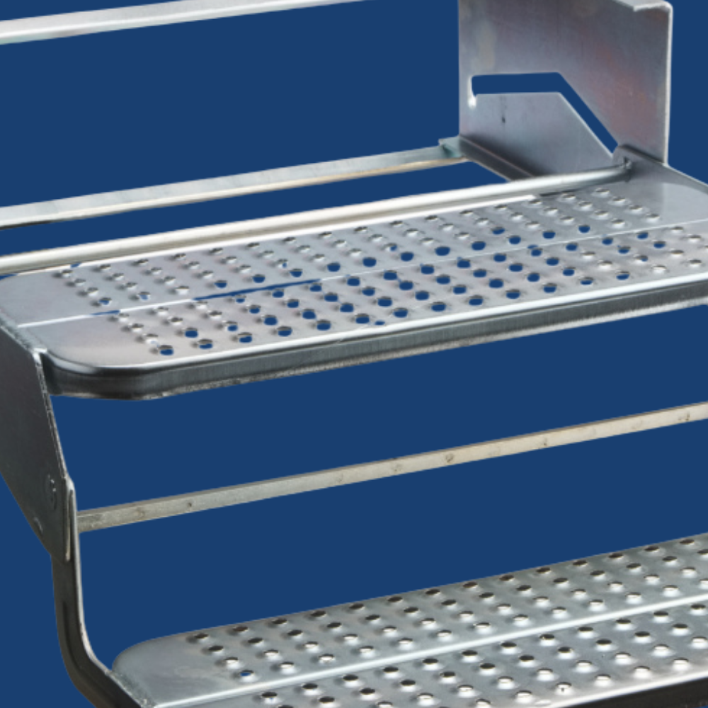 Metallic shelf with perforated design on a blue background