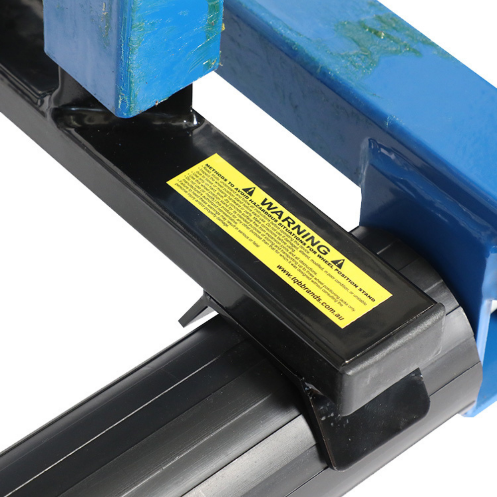 Zoomed-in view of adjustment mechanism, showing lever system and support brackets in detail.