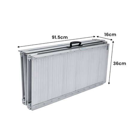 Folded ramp with labelled dimensions, showing compact size for storage or transport.