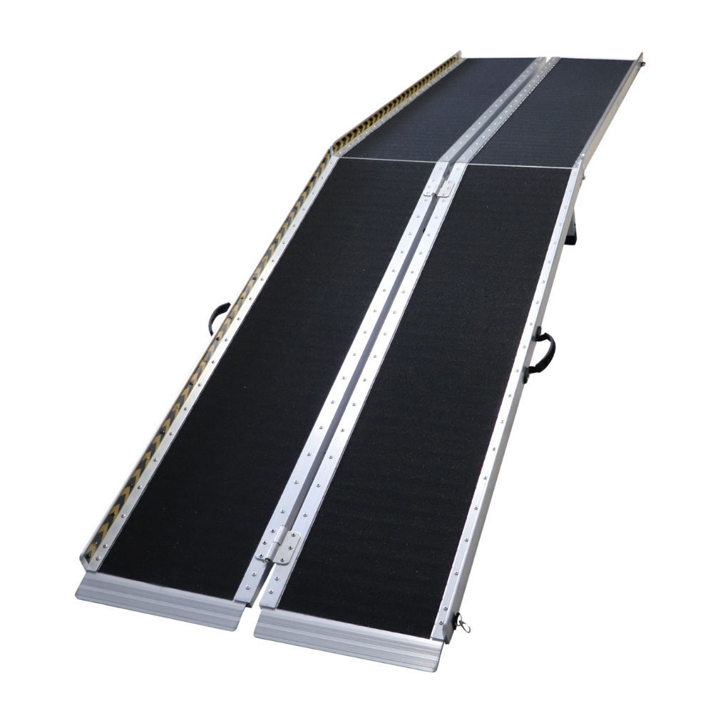 Top-down angled view of ramp fully unfolded, showing length and gritted anti-slip surface.