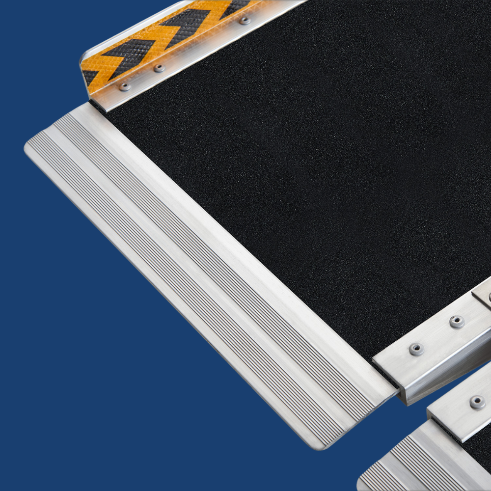 Close-up of safety grip tape and yellow edge strip, ensuring anti-slip protection.