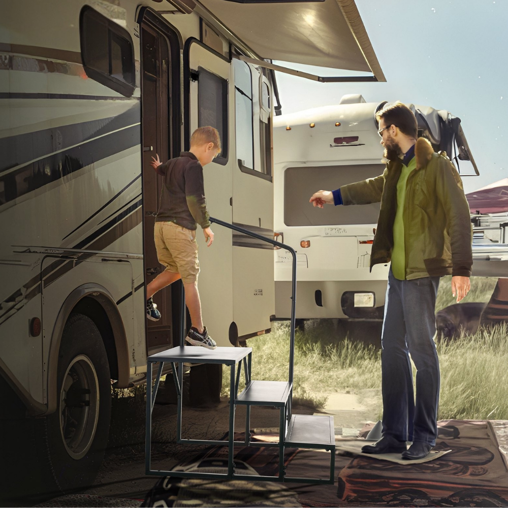 Man and child by an RV with step ladder in a grassy area