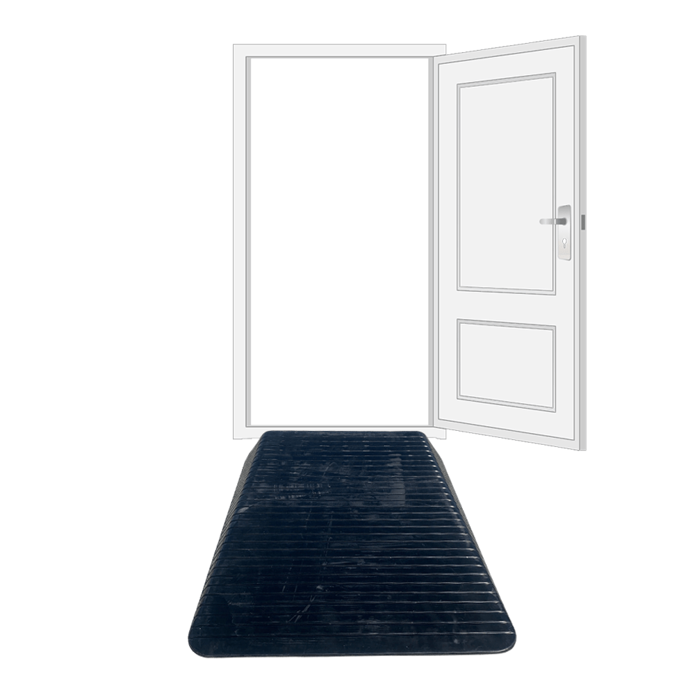 A black solid rubber wheelchair threshold door ramp with winged edges placed on adoorway
