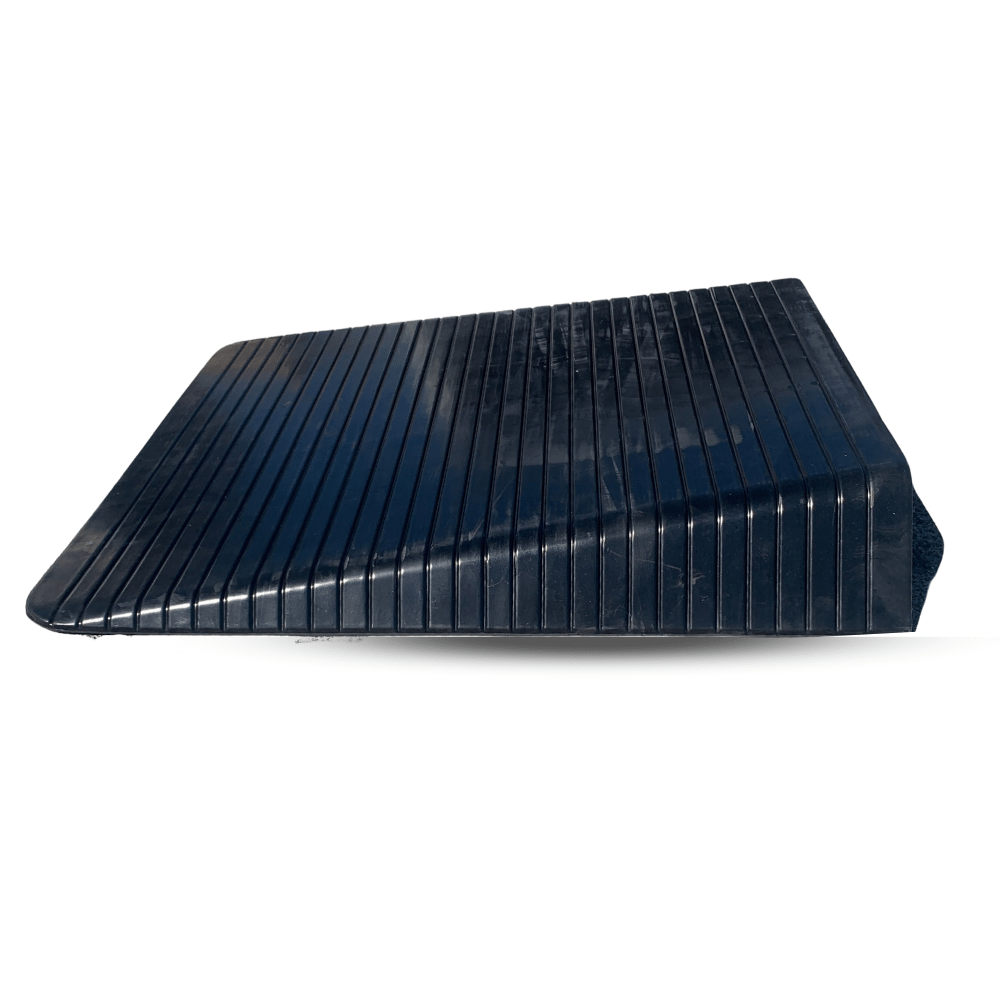 black rubber ramp side view on a white surface