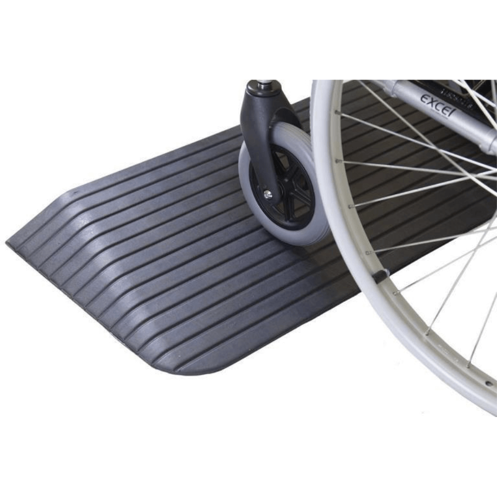 wheelchair on black rubber ramp