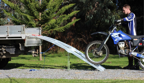 Motorcycle in action loading to a truck using Heeve ramp