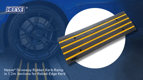 Product shot of the Heeve Driveway Rubber Kerb Ramp with yellow stripes next to a car tire, emphasizing its use for driveways.