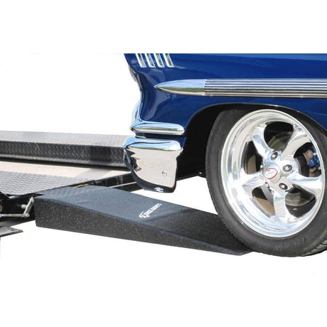 Car and truck loading ramps. Car wheel on ramp to trailer