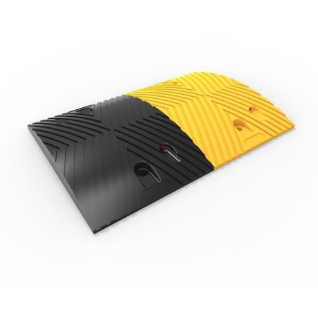 Black & yellow rubber traffic speed hump