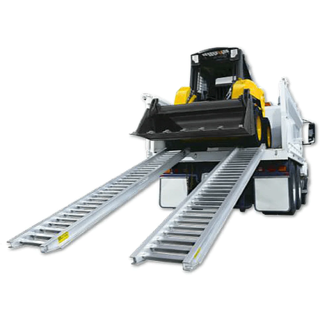 Construction Loading Ramps on truck with yellow skid steer loader from Ramp Champ