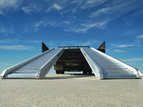 Digga Ezi-Loada aluminium loading ramps, pair hooked onto a truck tray