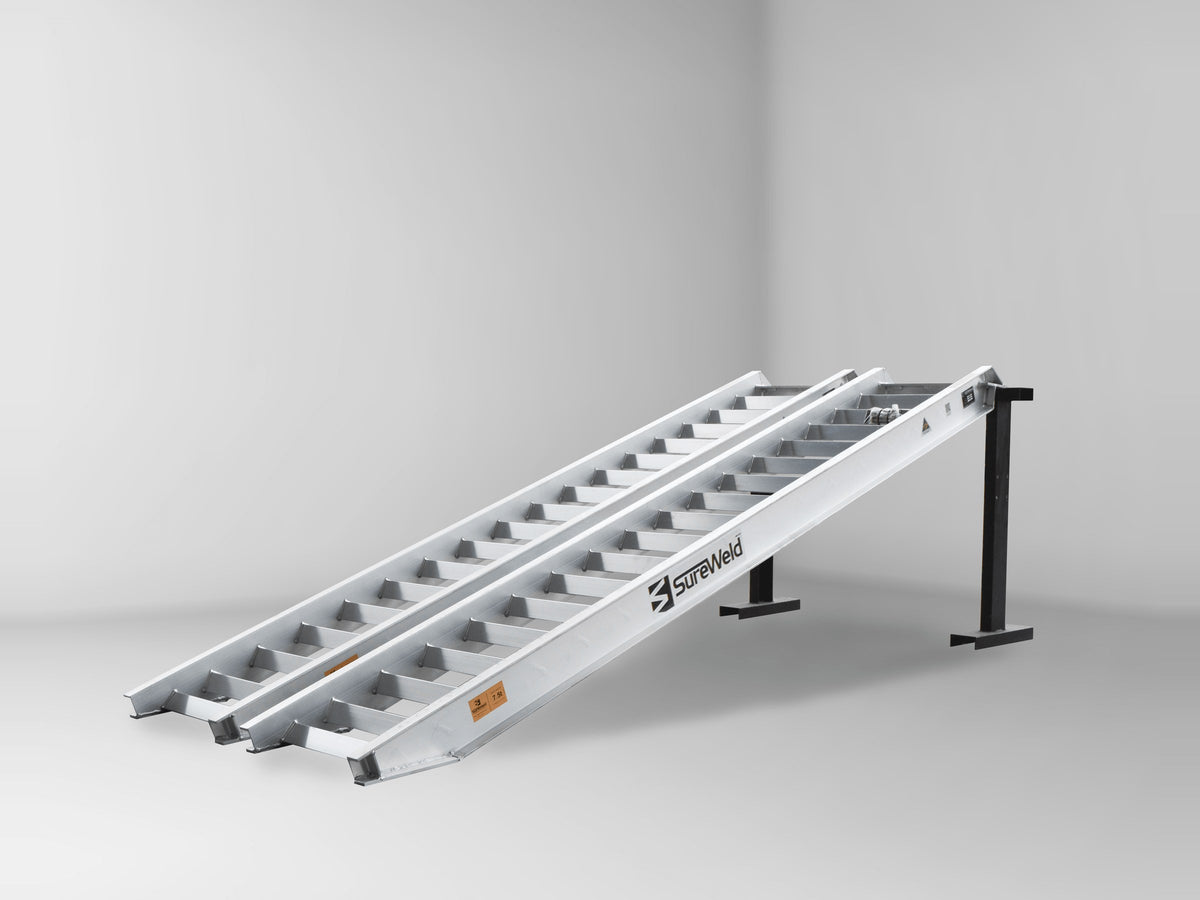 Sureweld 7.5-Tonne 3.6m x 600mm Track Series Aluminium Loading Ramps, pair, on stands
