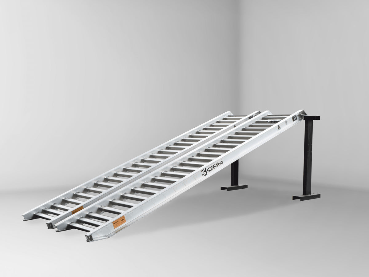 Sureweld 4.8-Tonne 3.3m x 510mm Rubber Series Aluminium Loading Ramps, pair, on stands
