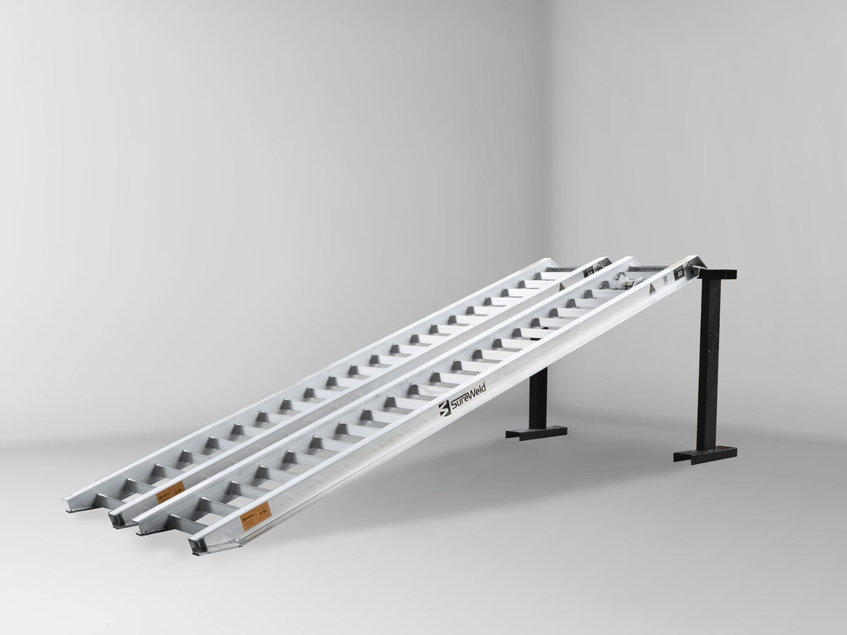 Sureweld Track Series Aluminium Loading Ramps, pair, on stands (shown: the 3.6m 4.5-Tonne model; the 4m model has the same rung design)