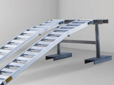 Close-up of the bent fold hinge that gives the Sureweld curved foldable ramp its two-angle profile