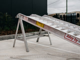 AusRamp 4.5-tonne ramp hook end on a stand with the S.W.L. 4.5 tonne load decal