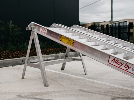 AusRamp 4.5-tonne ramp hook end on a stand with the S.W.L. 4.5 tonne load decal