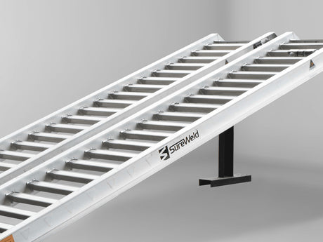 Close-up of the rungs on a Sureweld PT Series ramp, shaped for rubber-track loaders