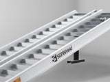 Close-up of the raised rungs on a Sureweld Track Series ramp, built for steel tracks