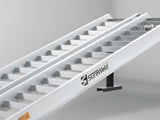 Close-up of the raised rungs on a Sureweld Track Series ramp, built for steel tracks