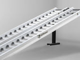 Close-up of the raised rungs on a Sureweld Track Series ramp, built for steel tracks