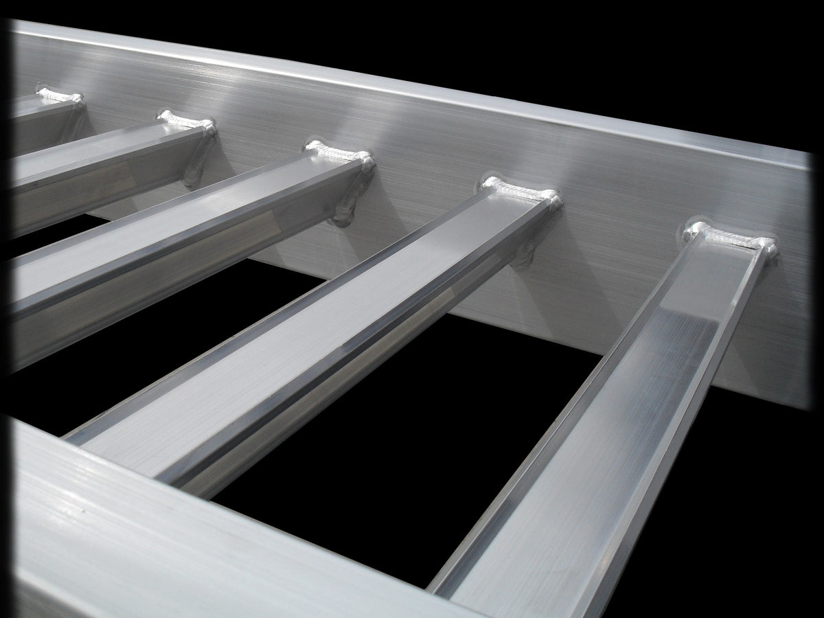 Close-up of the welded aluminium rungs on a Sureweld PT Series loading ramp