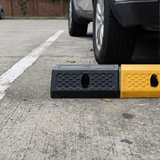 Animation of Base Guard® 500mm Rubber Wheel Stop in action