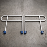 Heeve EasyRoll Modular Aluminium Rolling Ramp Handrail Kit displayed on a textured gray concrete floor.