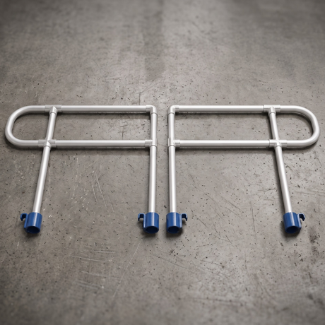 Heeve EasyRoll Modular Aluminium Rolling Ramp Handrail Kit displayed on a textured gray concrete floor.