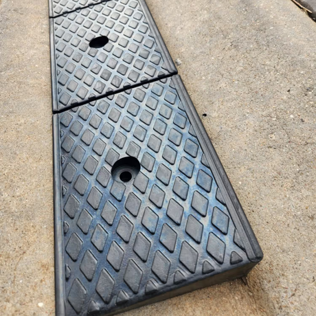 Black rubber on a concrete surface