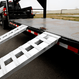 Gen-Y Hitch 4.5T 2.4m x 380mm Heavy Duty Aluminium Loading Ramps hooked on a gooseneck trailer deck