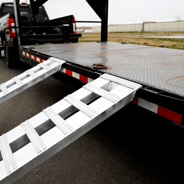 Gen-Y Hitch 4.5T 3.0m x 380mm Heavy Duty Aluminium Loading Ramps hooked on a gooseneck trailer deck