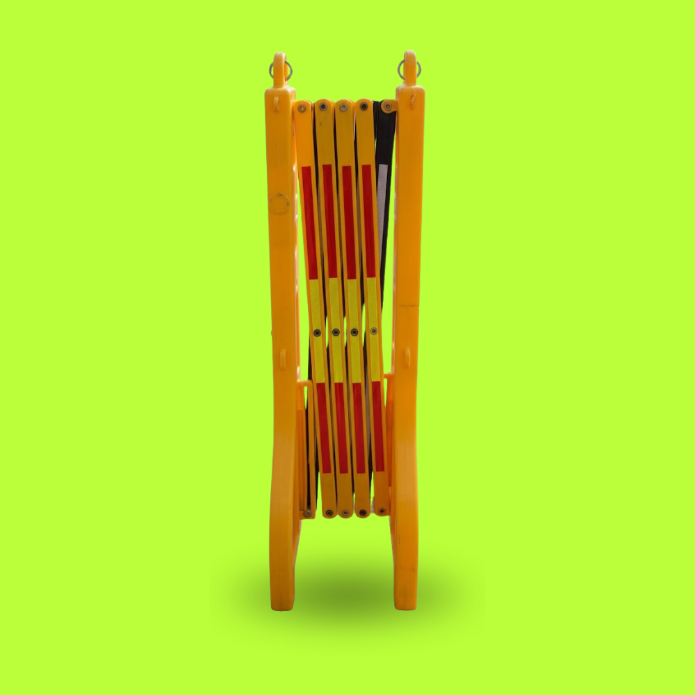 Base Guard 2.5m Expandable Plastic Safety Barrier - Yellow on a bright green background