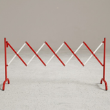 Red and white barrier on a gray background