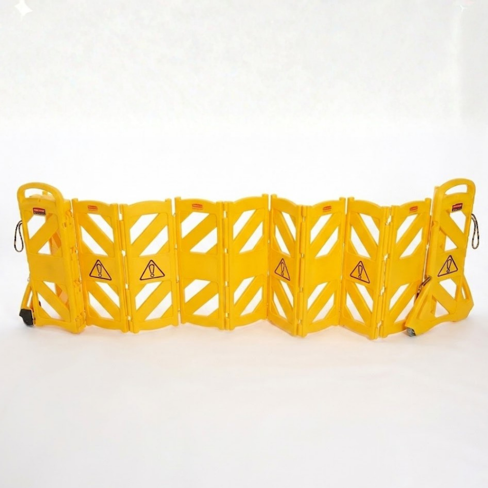 Yellow safety barrier with warning triangles on a white background