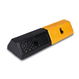 Black and orange traffic barrier on a white background